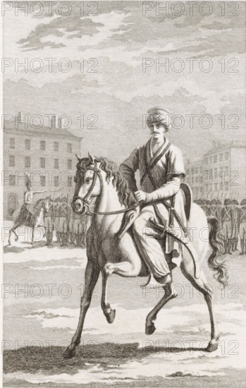 Mamluk on horseback, print, Turkish rider, soldiers behind him. In 1798, Napoleon invaded Egypt and defeated the Mamluks. Napoleon was impressed by the Mamluk cavalry and formed his own Mamluk corps for the French Imperial Army., printmaker: Izaak Jansz. de Wit, Haarlem, 1798 - 1809, paper, etching, proof print, height 198 mm x width 137 mm, slavery, serfs and enslaved persons, head-gear: turban, riding a horse, ass, or mule, rider, horseman, Asiatic races and peoples: Turks, A detailed engraving shows a man wearing a turban and layered clothing seated on a horse in the foreground, his right hand holding the reins and his left resting near his waist; the horse is depicted mid-step with a flowing mane and tail and visible tack. In the background there are rows of uniformed soldiers standing in formation and a mounted figure facing them, with multi-story buildings lining the scene behind the troops. The sky above is filled with layered, hatched clouds and the ground beneath the horse dis...