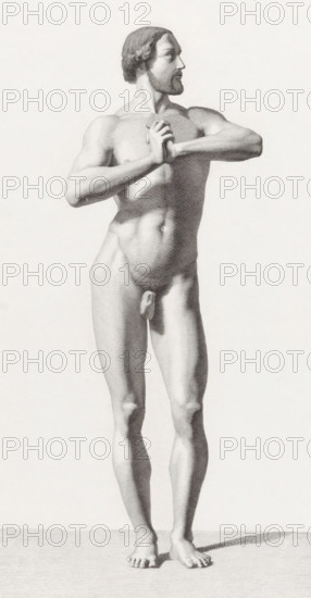 Standing male nude, print, with hands clasped., inscription: 'to the well-known Mr. Büchler, from his obedient servant', printmaker: Edouard Taurel, dedicated to: Daniël David Büchler (possibly), 1834 - 1892, paper, etching, engraving, etching and engraving on chine collé, height 440 mm x width 315 mm, hands folded, nude with covered genitals, human figure of ideal proportions, eg academic nude, A monochrome drawing of a standing nude male figure seen full-length, facing slightly to the side with his head turned to look outward, hair styled short and wavy and a short beard on his face, arms raised and hands clasped together near chest level, a defined muscular torso and abdomen, visible genitals, long legs with detailed musculature, bare feet planted on a textured ground, soft shadowing around the feet and under the body, and a plain light background.