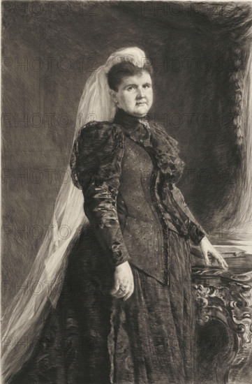 Portrait of Queen Emma, print, printmaker: Pieter de Josselin de Jong, 1890 - 1906, paper, chine collé, etching, intaglio printmaking technique, height 679 mm x width 423 mm, Person, Emma (Queen consort of the Netherlands), historical persons - BB - woman, A monochrome portrait of a woman standing with a long veil draped over her hair and shoulder, wearing a high-collared, long-sleeved dress with puffed upper sleeves and a fitted bodice decorated with small dots and lace trim, one hand resting on an ornately carved piece of furniture and the other hanging by her side, her hair swept up and a brooch at her throat, set against a dark, shaded background.