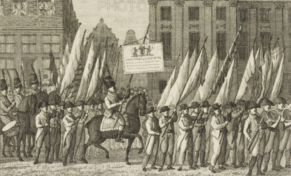Transfer of the Victory Banners to Amsterdam City Hall, 1806, print, By order of King Louis Napoleon, the victory banners are transferred to Amsterdam City Hall, August 1, 1806. A procession on foot and on horseback with banners captured from the enemy. In the center, a horseman with a banner made for this occasion., printmaker: Cornelis Bogerts, Netherlands, 1806 - 1816, paper, etching, height 112 mm x width 171 mm, Used as an illustration in: Arend Fokke Simonsz. De vaderlandsche historie in themata. Amsterdam: AB Saakes, 6th edition 1816., Person, Louis Napoleon (King of Holland), trophy, battle, war, military parade, pageant, ceremonial procession, parade, installation of a ruler, Amsterdam, Amsterdam City Hall (1655-1808), Period, 1806-08-01, A dense scene of a marching procession fills the image, with rows of men in period clothing and hats carrying long flags and poles, a mounted figure in uniform atop a horse near the center holding a banner, musicians with drums and wind instr...