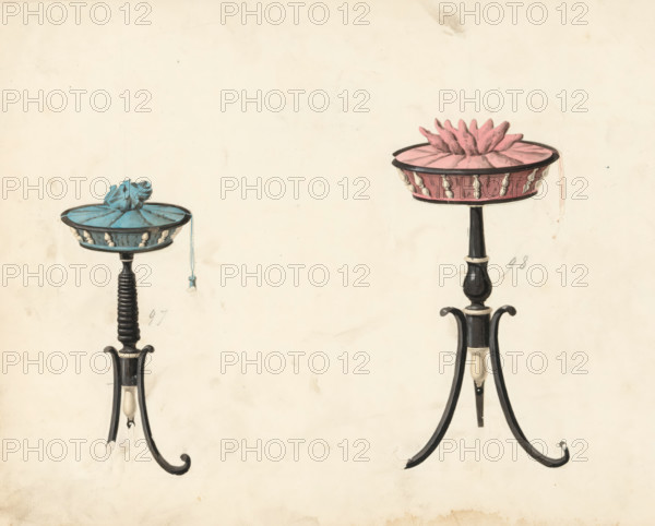 Two designs for a basket for children's toys, drawing, album page, Two designs for a basket on a leg for children's toys. The page on the back numbered: 44, the opposite page with information about the depicted furniture numbered: 44 bis. Part of an album with 80 pages of drawings and a print of veneered and lacquered furniture, as well as seating., inscription: '97 Corbeille à sac 9* 8* 6*½, 98 même prixe, Corbeille rouets l'enfants', Paris (possibly), c. 1825 - c. 1839, draftsman (artist), Paris, paint (coating), materials by function, paper, ink, watercolor (paint), pencil, pen, brush, gray pen with colored brush, numbers written in pencil, cut out and pasted onto the album page, height 240 mm, width 310 mm, (playing with) toys, furniture for storage (wood and other phytogenic materials), Two tall slender stands with tripod bases are depicted against a plain background; each stand has a round shallow dish on top with a gathered fabric cushion inside, one cushion colored blue and the...