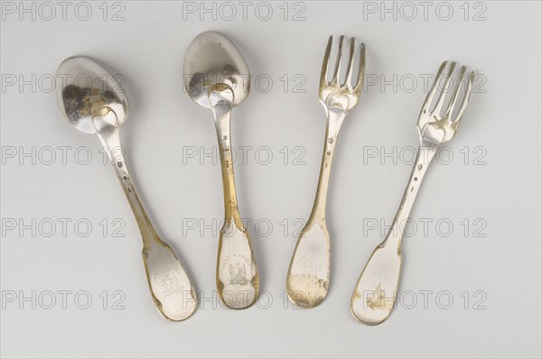 Two couples of spoons and forks