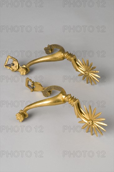 Pair of spurs in gilded bronze, 19th Century