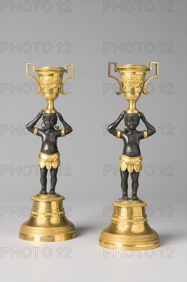 Pair of bronze candleholders, 19th Century