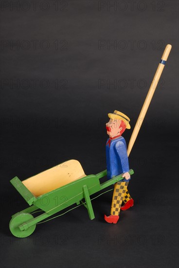 Toy : gardener and his wooden barrow