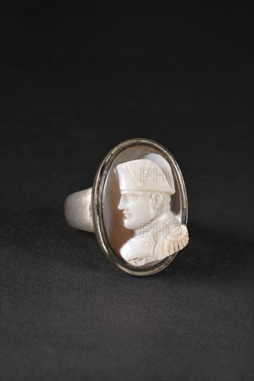 Ring decorated with a shell cameo.