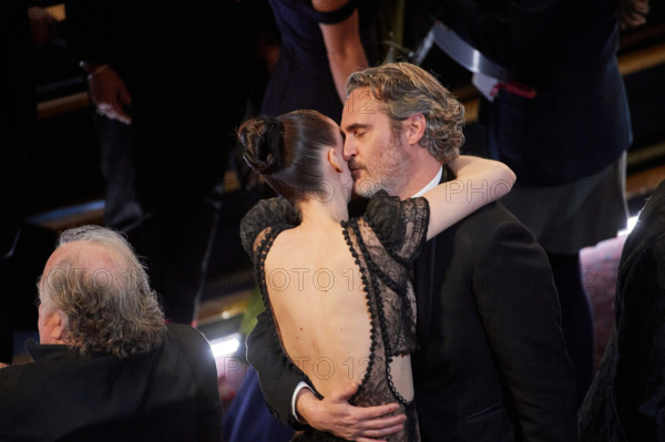Joaquin Phoenix hugs Rooney Mara after winning the Oscar for Actor In A Leading Role during the live ABC Telecast of Th