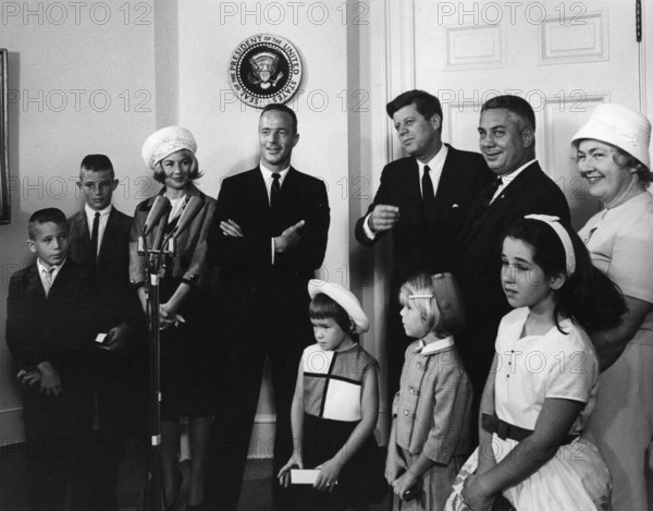 Visit of Astronaut Lt. Cmdr. Scott Carpenter family, 10:00AM. President John F. Kennedy visits with astronaut Lieutenant
