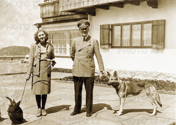 Eva Braun Photo Album Eva Anna Paula Braun (1912 - 1945) and Adolf Hitler (1889 - 1945) with their dogs. Negus and Katus