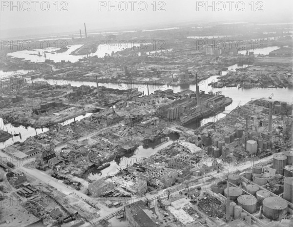 Royal Air Force Bomber Command, 1942-1945. Oblique aerial view of severely damaged docks in the Steinwerder district of