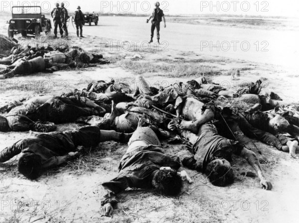 Vietnam: Bodies of dead NLF (Viet Cong) guerrillas lying piled up at Tan Son Nhat Airport, Saigon, February 1968 The Tet