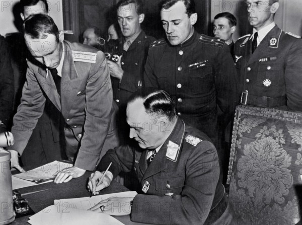 On May 7, 1945 the German General Alfred Jodl unconditionally surrendered all German forces to the Allies at Reims, in