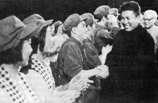 Cambodia: Saloth Sar, better known as Pol Pot, being welcomed by a Chinese opera troupe dressed in Cambodian clothing, B