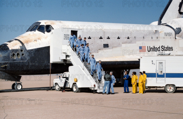 61A-S-140 (6 Nov 1985) --- The record-setting eight crewmembers for STS 61-A file from their home for the past week at t
