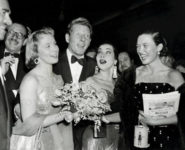 Mai Zetterling, Danny Kaye, Yma Sumac, the Peruvian singer, and program seller, Julie Wilson at The European premiere of