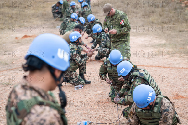 RECORD DATE NOT STATED Explosive Ordnance Disposal (EOD) and Counter-IED course students prepare charges while demonstr