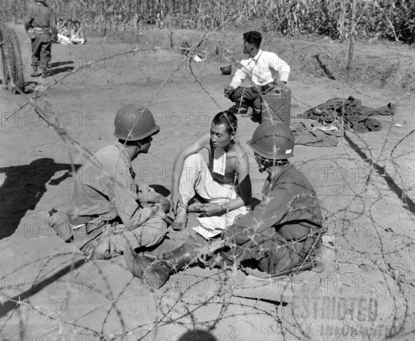RECORD DATE NOT STATED Korea: During the Korean War (1950-1953) an interrogation team of the US 7th Infantry Division qu