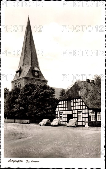 Heiligenfeld Syke, Gaststätte Heinrich Otersen, Kirchturm, VW Käfer *** Heiligenfeld Syke, Heinrich restaurant Otersen,