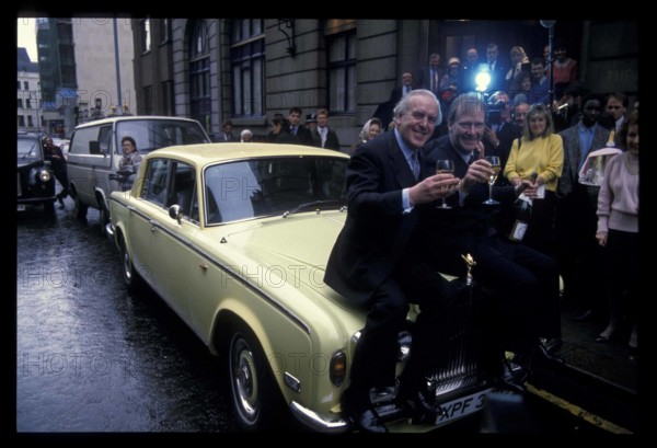 RECORD DATE NOT STATED  GEORGE COLE & DENNIS WATERMAN Ref:026 car, drinks, fans London Great Britain Copyright: xPhilxLo