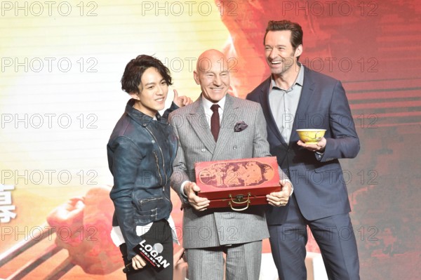 BEIJING CHINA MARCH 01 L R Taiwanese singer Yoga Lin English actor Patrick Stewart Australia