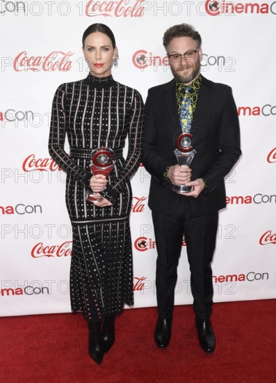 LAS VEGAS, NV - APRIL 04: Charlize Theron and Seth Rogen at the 2019 CinemaCon Big Screen Achievement Awards at The Col
