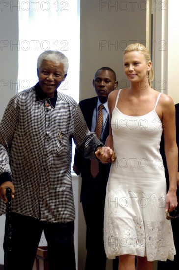 SOUTH AFRICA MANDELA CHARLISE THERON South African Oscar winner Charlize Theron burst into tears