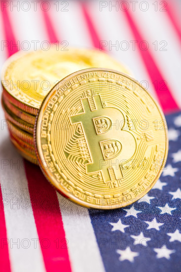 Bitcoin gold coin. Cryptocurrency on american flag Bitcoin gold coin. Cryptocurrency on the american flag Copyright: xZo