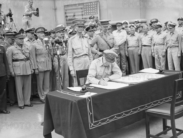Japanese Surrender at Tokyo Bay, 2 September 1945 General of the Army, Douglas MacArthur signs the surrender as Supreme