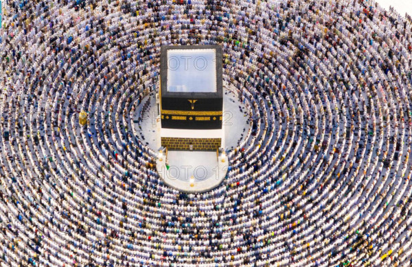 The Muslim hasty pilgrims perform the farewell tawaf around Kaaba, the holiest site in Islam