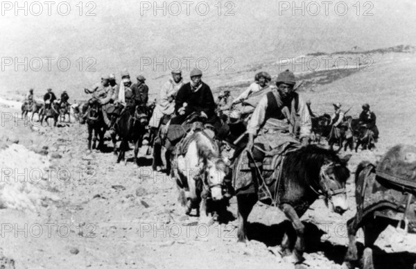 RECORD DATE NOT STATED China: Tenzin Gyatso, the 14th Dalai Lama (centre, white horse) escaping from Tibet to India, 195