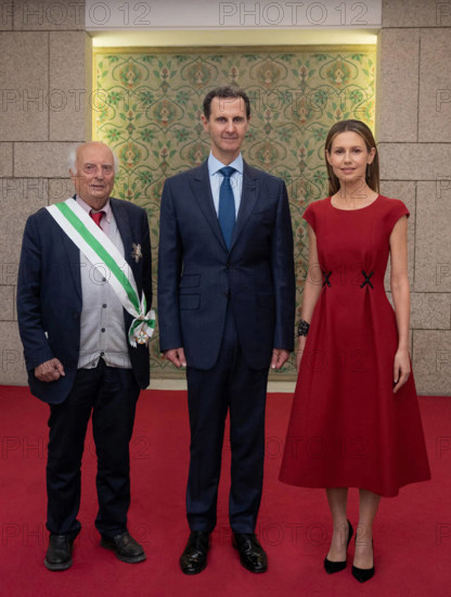 Syrian President Bashar al-Assad and the First Lady Asma al-Assad receive the participants in the international conferen