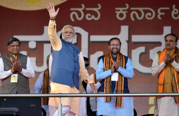 BENGALURU, INDIA - FEBRUARY 4: Prime Minister Narendra Modi waves hand as Karnataka state assembly leader of Opposition
