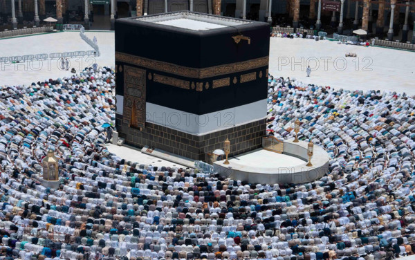 The Muslim hasty pilgrims perform the farewell tawaf around Kaaba, the holiest site in Islam