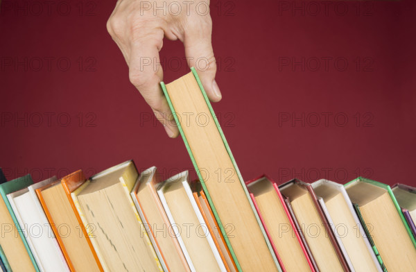 Stack of colorful books. Education and entertainment concept Stack of colorful books. Education and entertainment concep