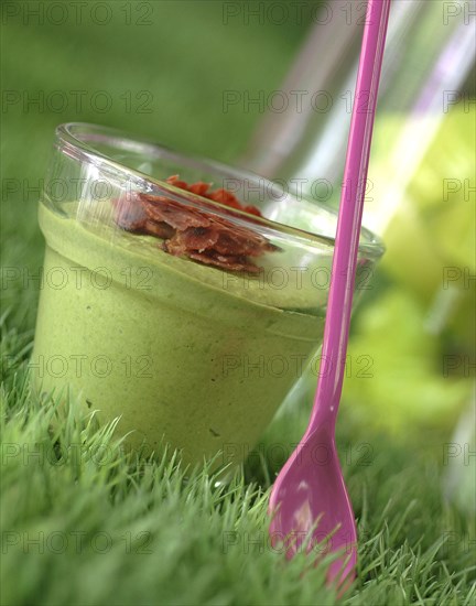 Meal in pink and green theme: green peas Bavarian cream, crispy bacon bites