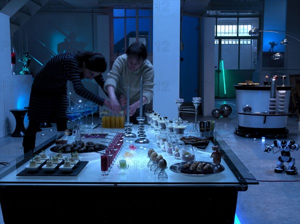 Totally Space theme dinner: Diane setting up the buffet
