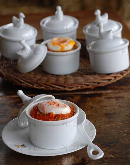 Eggs for dinner: sweet cooked vegetables with poached egg