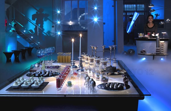 Totally Space theme dinner: Diane setting up the buffet