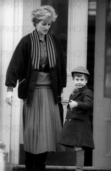 Prince William, aged 4, pictured with mother, Princess Diana, on his first day at Wetherby boys school in London, 15th January 1987.

Arriving at the £785 a term pre-preparatory school near Kensington Palace, in a grey uniform.