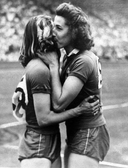 1948 Olympic Games 
 Micheline Ostermeyer celebrates with another team member  after complete her discs throws in the Wembley Stadium