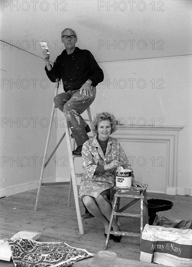 Margaret Thatcher spent the weekend in the country with her husband Dennis decorating their new country Belfry Flat at Scotney Castle, Lamberhurst, near Tunbridge Wells,Kent.
December 1975 
Dressed for the occasionin a matching green jumper and skirt with a printed overall she wielded a paintbrush like a profesional.
She explained that it would have cost £75.00 per room to have the decorators in, and reminded us that Churchill had once built a wall.