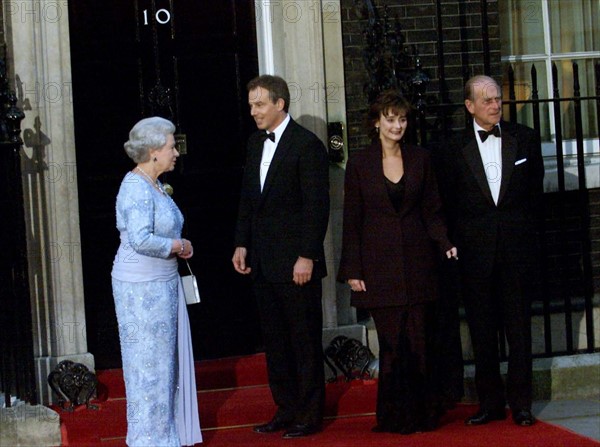 Queen Elizabeth  April 2002 with Tony Blair and Cherie Blair and HRH Prince Philip Duke of Edinburgh outside 10 Downing Street following a reception to celebrate the Queen Golden Jubilee.