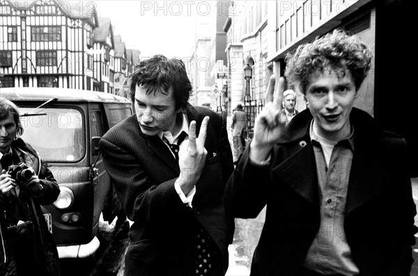 Sex Pistols singer Johnny Rotten leaving Malborough Street Court after being fined for posessing an illegal drug.
11th March 1977.