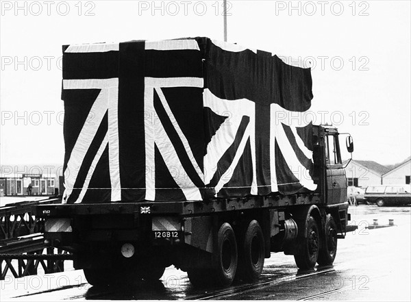 Leaving Southampton dock sixty four bodies brought back from the Falklands in Union Jack draped containers aboard the Royal Air Fleet Auxiliery Sir Bedivere.  After the inquest they will be claimed by families and regiments.  Twenty two will have a military funeral the others will be buried privately 
November 1982