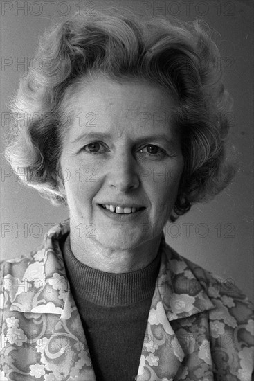 Margaret Thatcher spent the weeekend in the country with her husband Dennis decorating their new country Belfry Flat at Scotney Castle, Lamberhurst, near Tunbridge Wells,Kent.
December 1975 
Dressed for the occasionin a matching green jumper and skirt with a printed overall she wielded a paintbrush like a profesional.
She explained that it would have cost £75.00 per room to have the decorators in, and reminded us that Churchill had once built a wall.