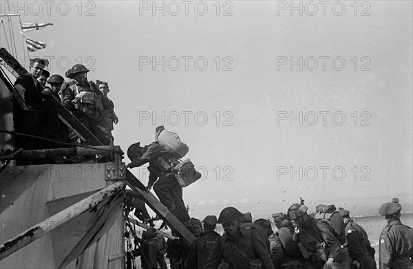 British re enforcement land on Gold beach for the big push into the Normandy town of Caen. June 16th 1944