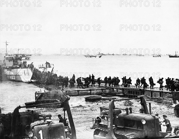 Allied troops landing on a beach in Normandy France  1944