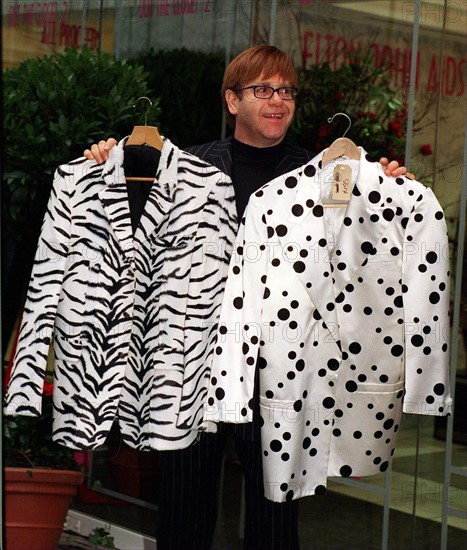 Elton John in his shop in Dover Street November 1997 - where he is selling some of his old clothes for his Aids Charity