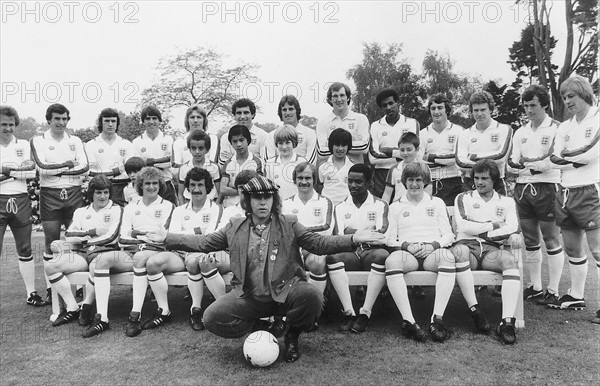 Elton John superstar and members of the England football team pose with schoolchildren in a photoshoot organised by the Professional Footballers Association and League clubs