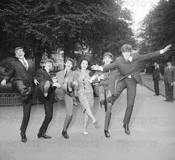 John Lennon Paul McCartney George Harrison and Ringo Starr with Billy J Kramer and Susan Maughan celebrate their success at Victoria Embankment Gardens in before a lunch at the Savoy to celebrate the Variety Club's awards London 10 September 1963
